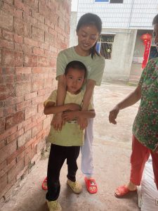 picture of boy with autism and his mom