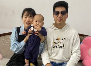 baby who is visually impaired pictured with her legally blind parents