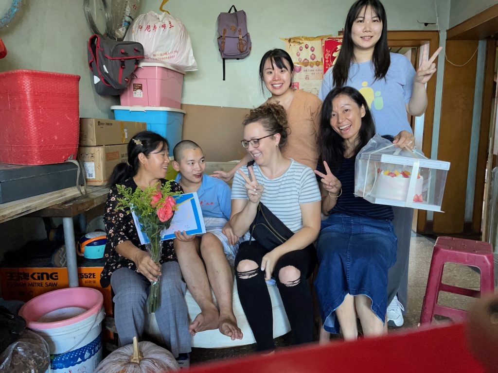 XiaoHang's family and Hope Station staff in 2023